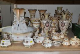A LARGE QUANTITY OF BLUSH IVORY WARES, comprising wash bowl and pitcher, vases, planters, dressing