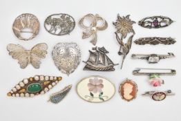 A SELECTION OF SILVER AND WHITE METAL BROOCHES, to include a late Victorian silver brooch, an