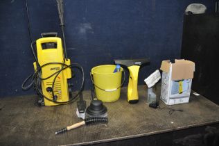 A KARCHER K2.54 PRESSURE WASHER with lance and two brush attachments, a Karcher Window vac in