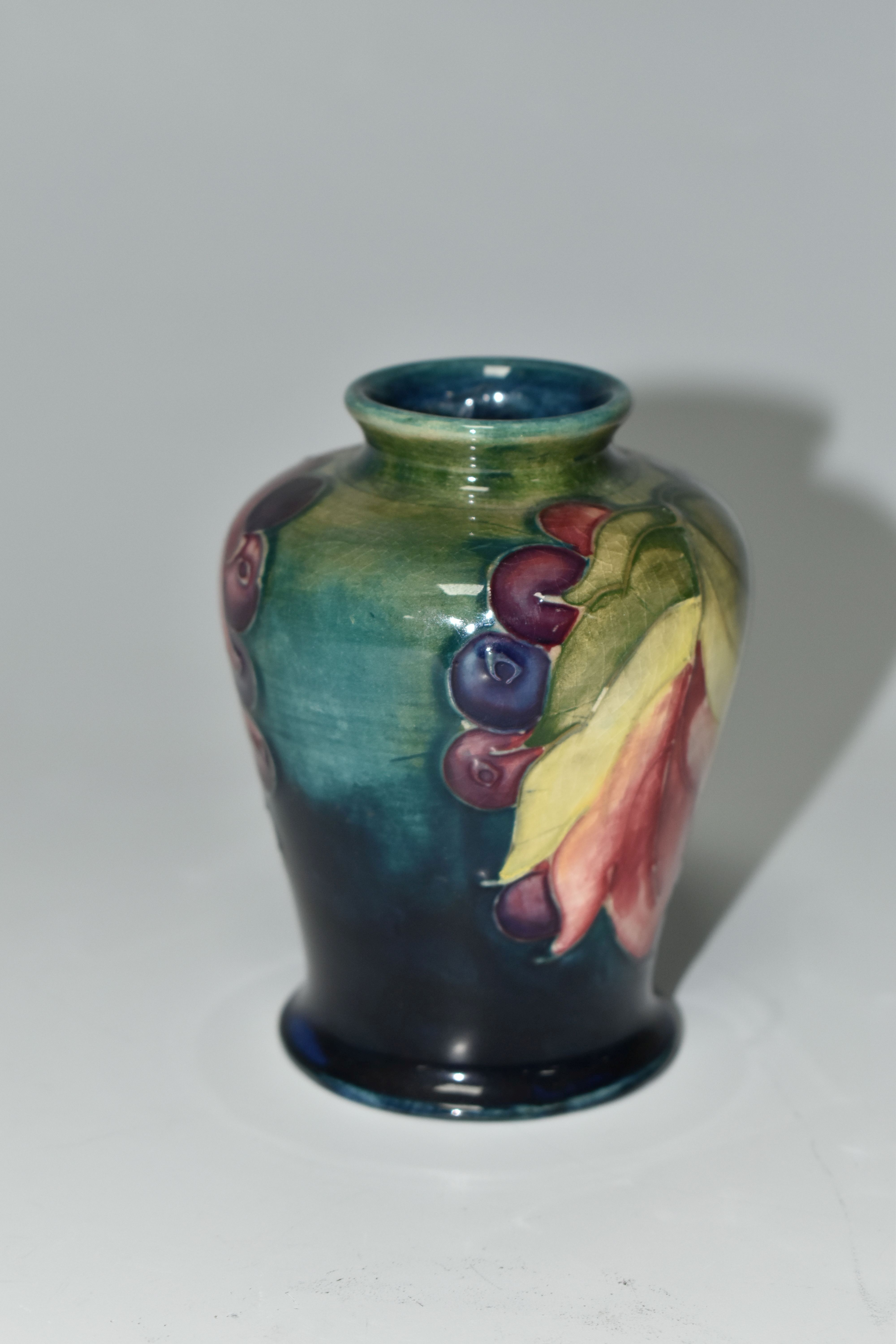A MOORCROFT POTTERY 'LEAF AND BERRY' PATTERN VASE, of small shouldered form, tube lined with - Image 3 of 5