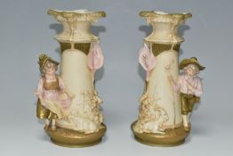 A PAIR OF ROYAL DUX FIGURAL VASES, comprising a young shepherd boy and goat on one vase, the other