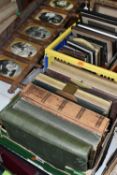 THREE BOXES OF EARLY 20TH CENTURY EPHEMERA containing eight albums of postcards and personal