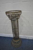 A GILDED WIRE JARDINIÈRE STAND, with a Corinthian pillar style support, diameter 48cm x height 111cm