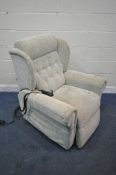 THE RECLINER FACTORY, A BEIGE UPHOLSTERED RISE AND RECLINE ARMCHAIR (condition report: in need of