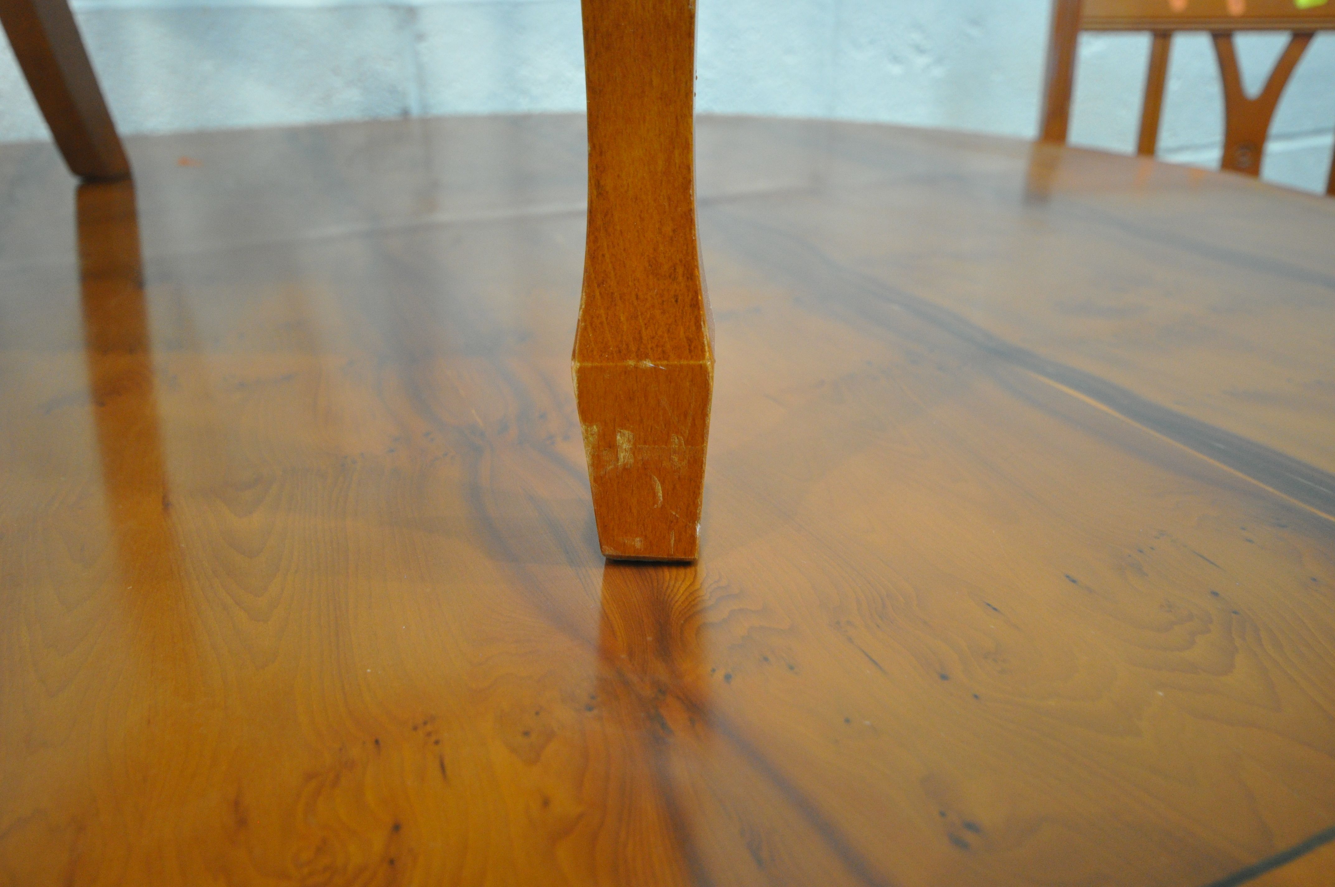 A 20TH CENTURY YEW WOOD OVAL TWIN PEDESTAL EXTENDING DINING TABLE, with one additional leaf, - Image 3 of 4