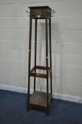 A 20TH CENTURY OAK HALL COAT/HAT STAND, with eight hooks, 43cm squared x height 184cm (condition