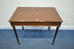 AN EDWARDIAN MAHOGANY RECTANGULAR CENTRE TABLE, on cylindrical tapered legs, width 92cm x depth 61cm