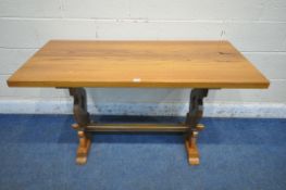 A 20TH CENTURY ELM REFECTORY TABLE, on trestle legs, united by a block stretcher, length 128cm x
