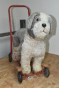A PEDIGEE PUSH-ALONG OR RIDE-ON DOG, c.1960's, complete and in fairly good condition with only minor