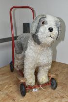 A PEDIGEE PUSH-ALONG OR RIDE-ON DOG, c.1960's, complete and in fairly good condition with only minor