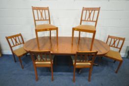A 20TH CENTURY YEW WOOD OVAL TWIN PEDESTAL EXTENDING DINING TABLE, with one additional leaf,