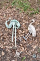 A LARGE METAL FIGURE OF A FLAMINGO appears to be painted copper with brass feet and a plastic