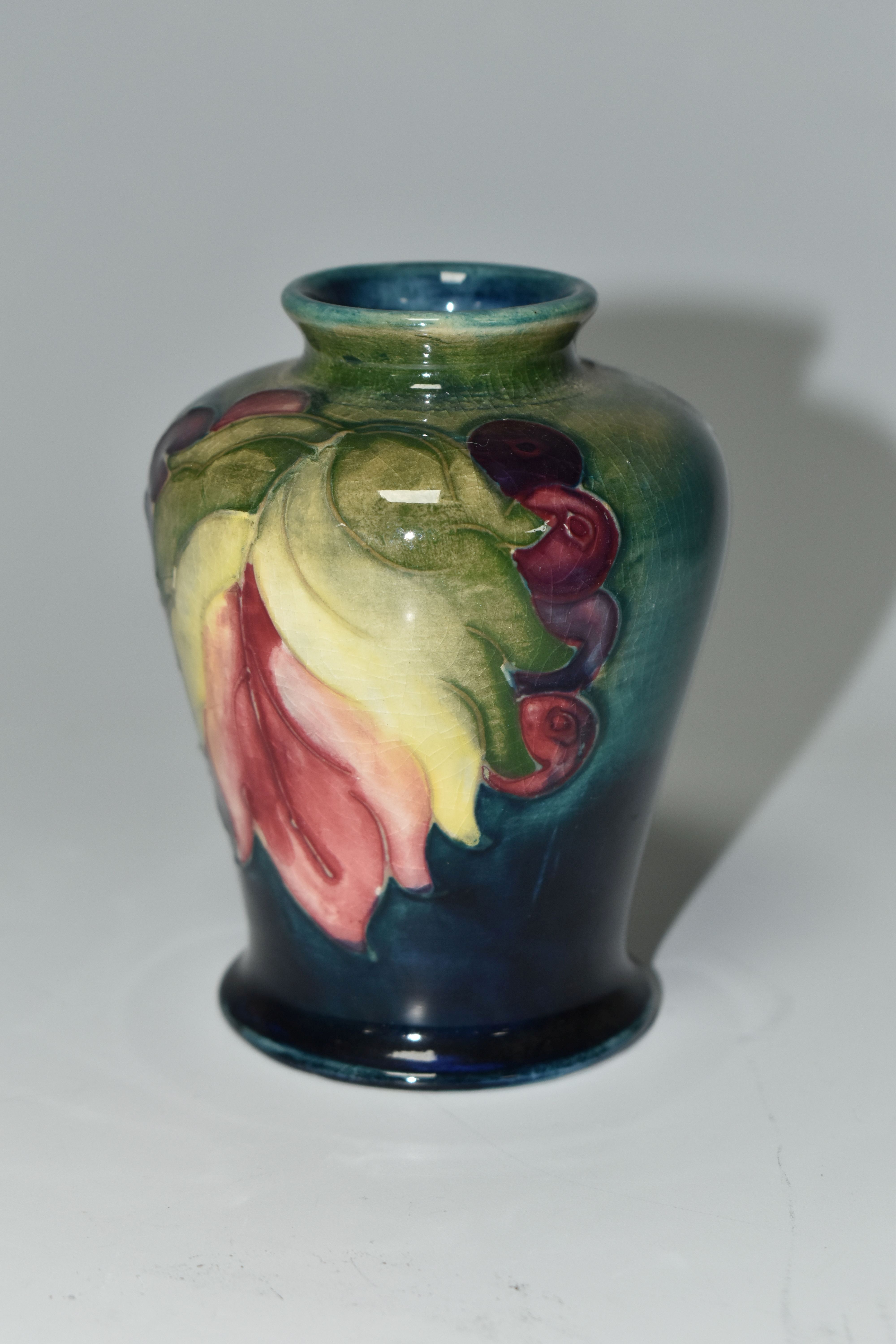 A MOORCROFT POTTERY 'LEAF AND BERRY' PATTERN VASE, of small shouldered form, tube lined with - Image 2 of 5