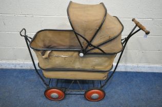 A 1920'S CARRIAGE TRAV-L-EEZ COACH PRAM, with folding canopy (condition report: ideal for