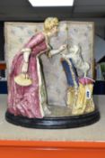 A CONTINENTAL PORCELAIN FIGURAL PLANTER, comprising a figure of lady training her small dog with