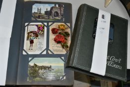 TWO ALBUMS OF POSTCARDS containing approximately 564 early 20th century cards (with exceptions)