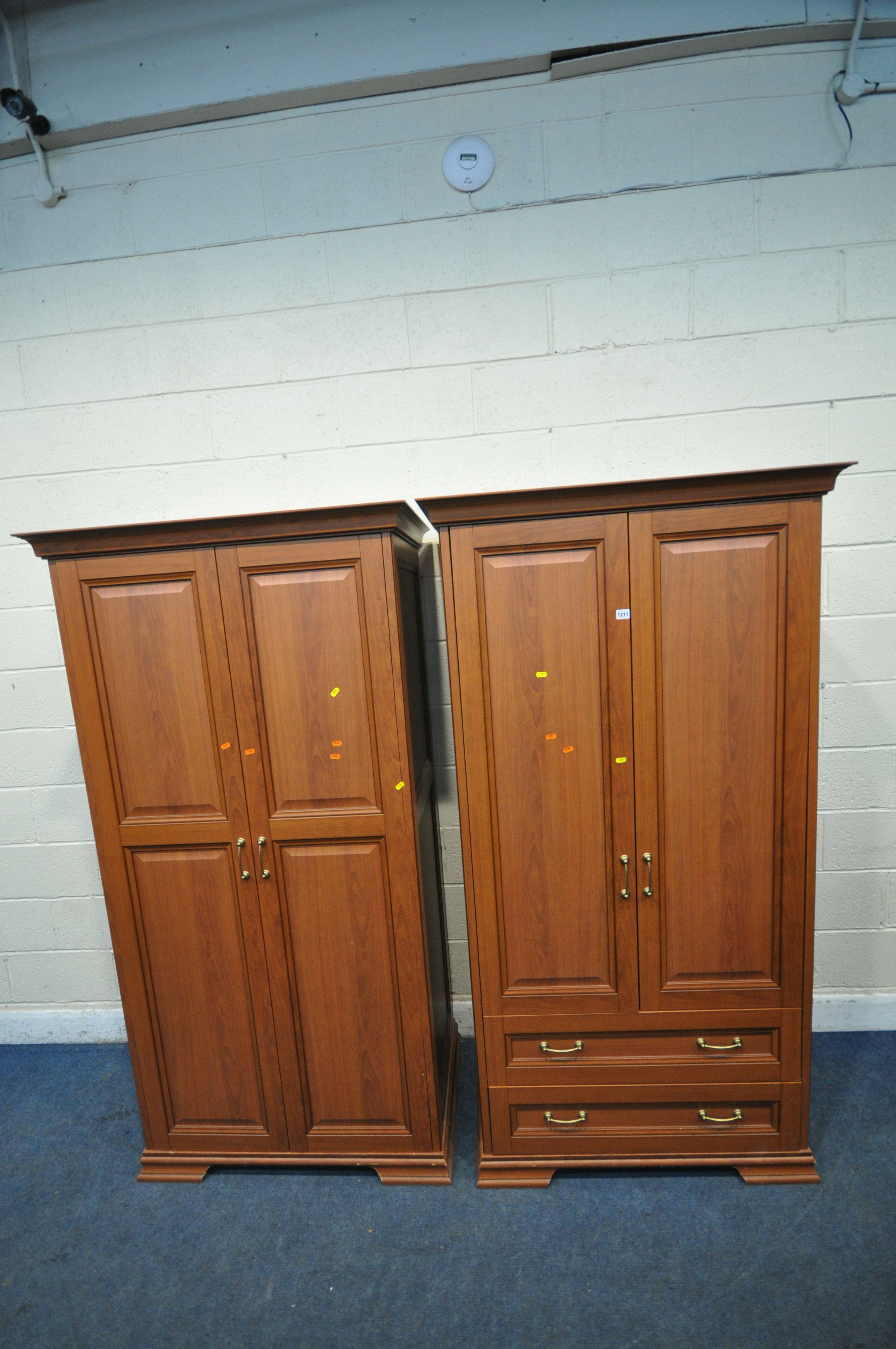A MODERN TWO PIECE BEDROOM SUITE, comprising a double door wardrobe, with two drawers, width 100cm x
