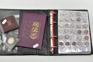 A SMALL COIN ALBUM OF MIXED COINAGE, to include Silver Crown size 1896 Morgan Dollar, France 10