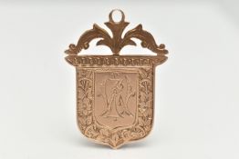 A LATE VICTORIAN 9CT GOLD FOB MEDAL, shield shape fob with foliate pattern and engraved monogram,
