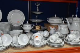 A LARGE QUANTITY OF CONTEMPORARY NORITAKE 'MELISSA' PATTERN DINNNERWARE, comprising two covered