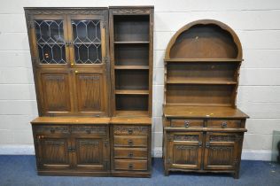 A 20TH CENTURY OLD CHARM OAK DRESSER, the arched two tier plate rack, atop a base with two drawers