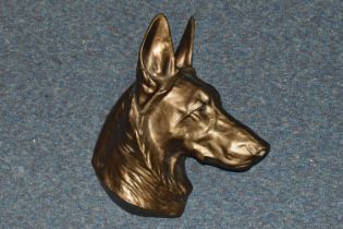 A BRONZED CAST METAL WALL PLAQUE OF A GERMAN SHEPHERD / ALSATIAN DOG'S HEAD, height 40cm approx. (