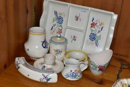 EIGHT PIECES OF POOLE POTTERY, all with floral decoration, including an hors oeuvres dish, an eggcup
