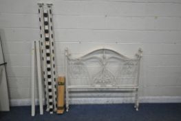A WHITE TUBULAR 4FT6 BEDSTEAD, with side rails and slats, along with another white tubular metal
