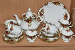 A ROYAL ALBERT 'OLD COUNTRY ROSES' PATTERN TEA SET, comprising a teapot, cake plate, milk jug, sugar