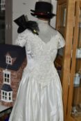 A MON CHERIE BRIDALS INC POLYESTER WEDDING DRESS WITH SEQUIN AND PEARL DETAILS, SIZE 14, together