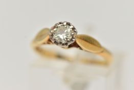 AN 18CT GOLD DIAMOND SINGLE STONE RING, round brilliant cut diamond claw set within an illusion