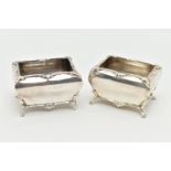 A PAIR OF GEORGE V SILVER SALTS, each of a rectangular form with swag detail to the rim, raised on