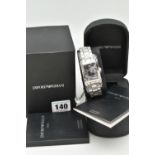 AN EMPORIO ARMANI GENTLEMAN'S WRISTWATCH, the rectangular black face with Roman numerals and