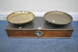 A SET OF EARLY 20TH CENTURY FRENCH SCALES, with two brass bowls, the brass plaque to front