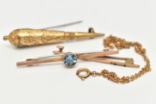 THREE BROOCHES AND A CHAIN, to include a rose metal bar brooch set with a light blue circular cut