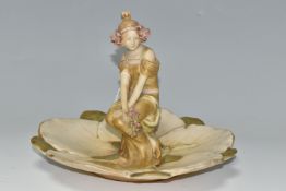 A ROYAL VIENNA Ernst Wahliss porcelain Art Nouveau centrepiece, comprising a figure of a young