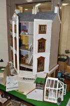 A MODERN FOUR STOREY DOLLS HOUSE OF GEORGIAN STYLE WITH A QUANTITY OF ACCESSORIES, the top three