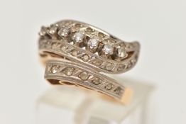 A GEM SET RING, a bypass style ring, set with thirty three circular cut colourless stones,