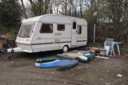 A 1994 ABBEY PIPER 14.5 EX 5 BERTH TOURING CARAVAN with two sets of keys, fridge, sink, cooker,