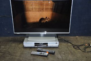 A PANASONIC TX-32E6B 32in SMART TV with remote and a DMRE85H DVD player with remote (both PAT pass