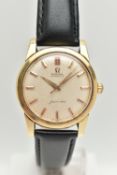 AN OMEGA AUTOMATIC SEAMASTER WRISTWATCH, the circular face with gold coloured hour markers and