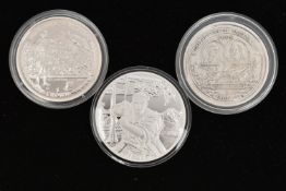 A SMALL PACKET OF CROWN SIZE COINS, to include Isle of Man Silver Proof (Battle of Waterloo) Crown