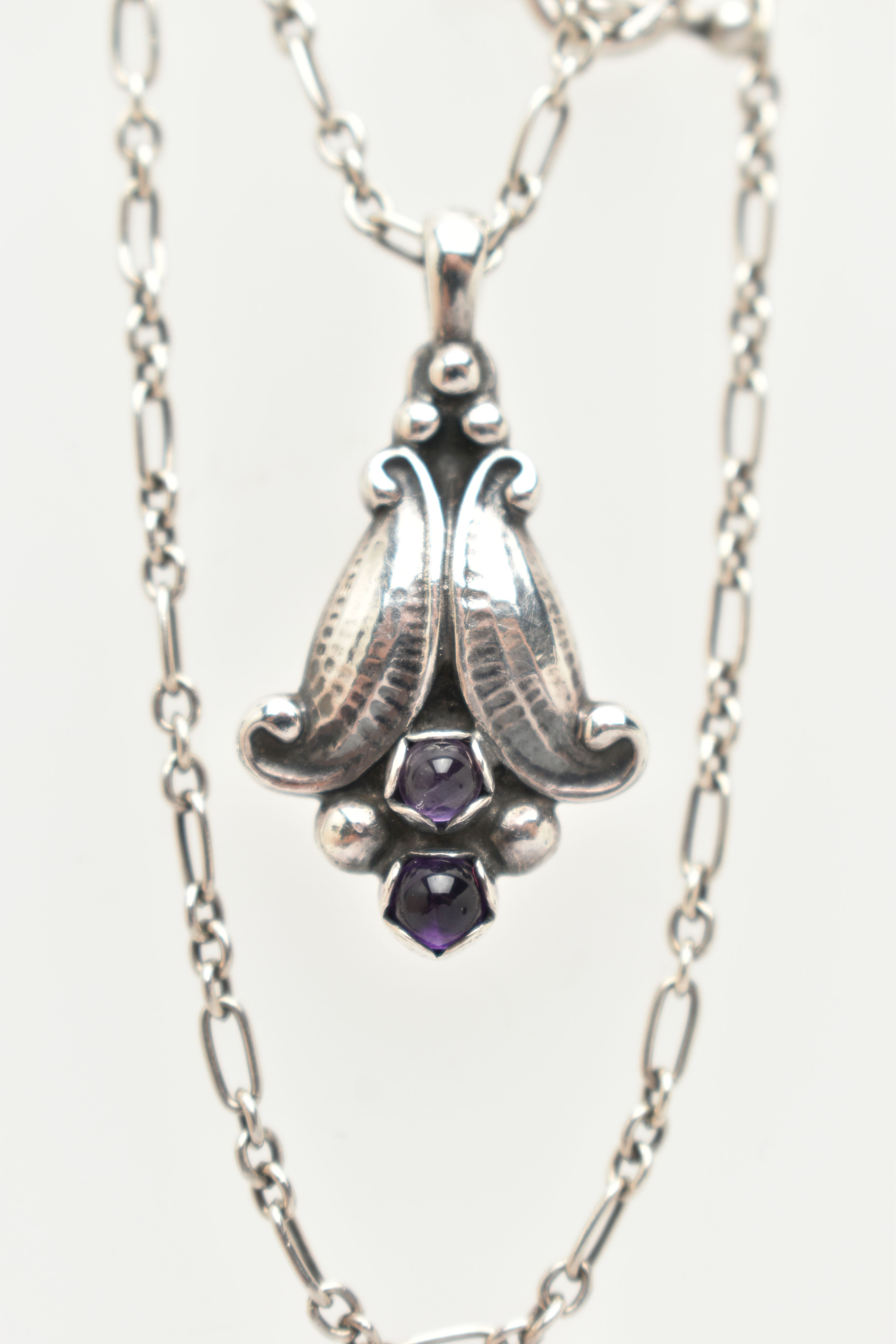 A BOXED 'GEORG JENSEN' PENDANT NECKLACE, floral drop pendant set with two amethyst dome cabochons, - Image 4 of 5