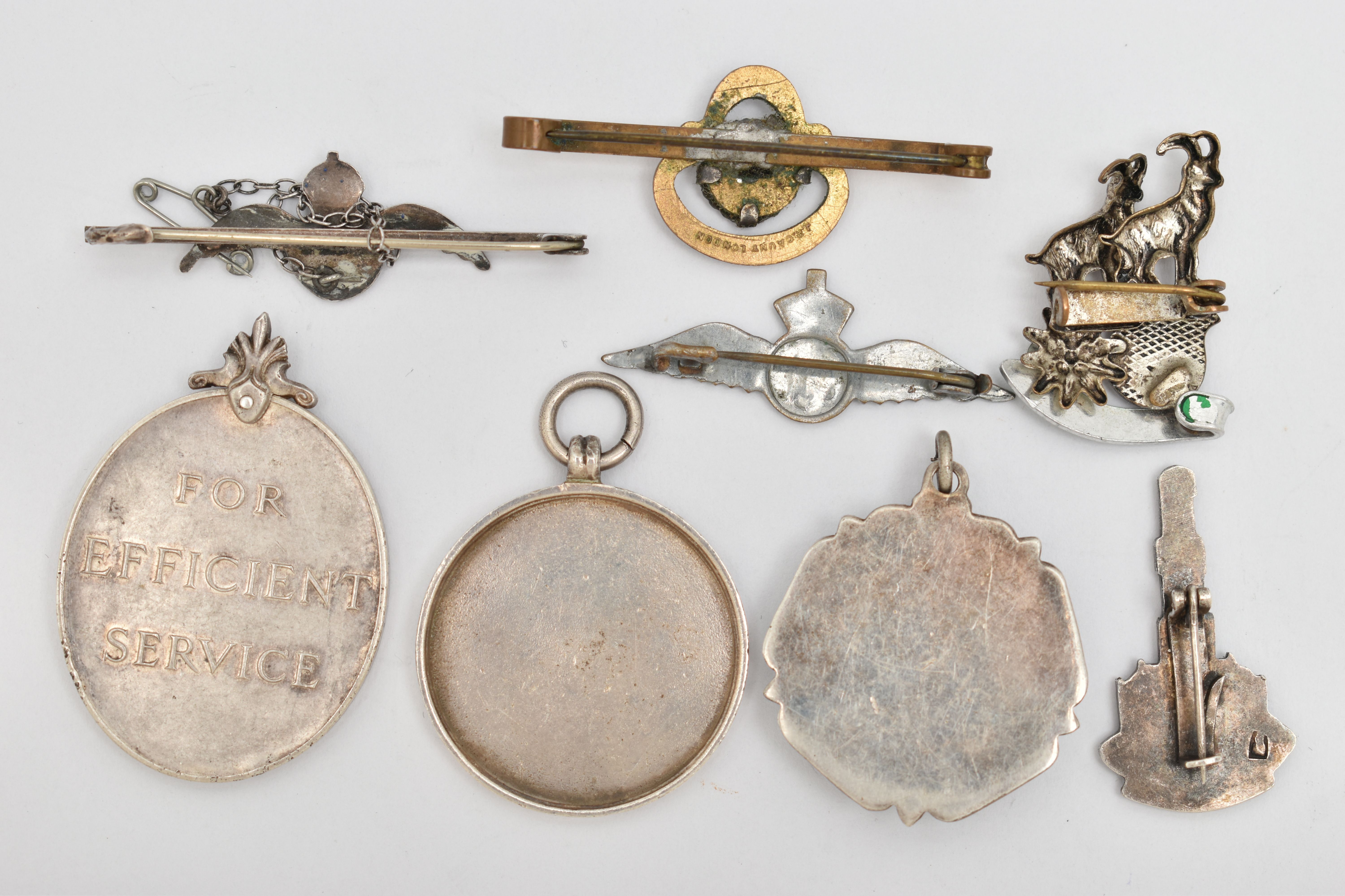 A SELECTION OF MEDALS AND BROOCHES, to include a George VI medal 'For Efficient Service,' edge - Image 2 of 2