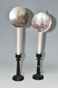 A PAIR OF EBONY CANDLESTICKS WITH CARVED SHELL REFLECTORS, the ebony candlesticks with column like