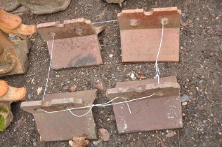 FOUR VICTORIAN RIDGE TILES with castellated tops