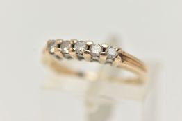 A 9CT GOLD DIAMOND FIVE STONE RING, set with a row of five small, round brilliant cut diamonds,