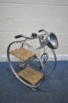 A BESPOKE VINTAGE BICYCLE WHEEL FLOOR LAMP, with two shelves, width 50cm x depth 65cm x height