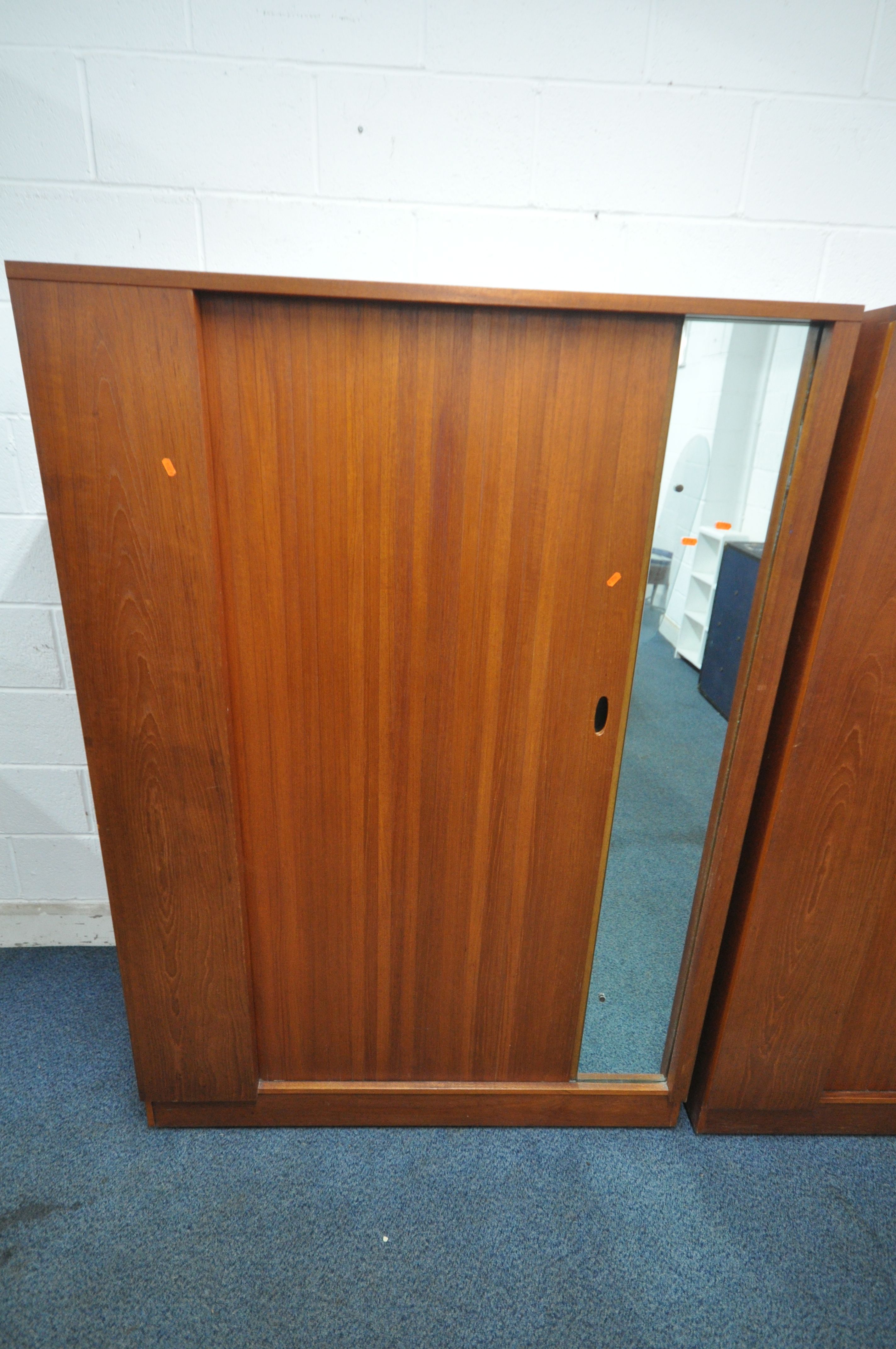 AN AUSTINSUITE MID CENTURY TEAK WARDROBE, with a single tambour sliding door and mirror, width 122cm - Image 2 of 4