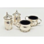 AN IRISH SILVER CONDIMENT SET, the double handled salts with blue glass liners, and two matching